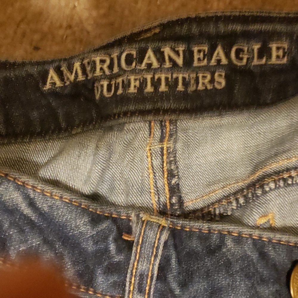AMERICAN EAGLE JEGGING super stretch jeans. Dark denim blue with lighter areas